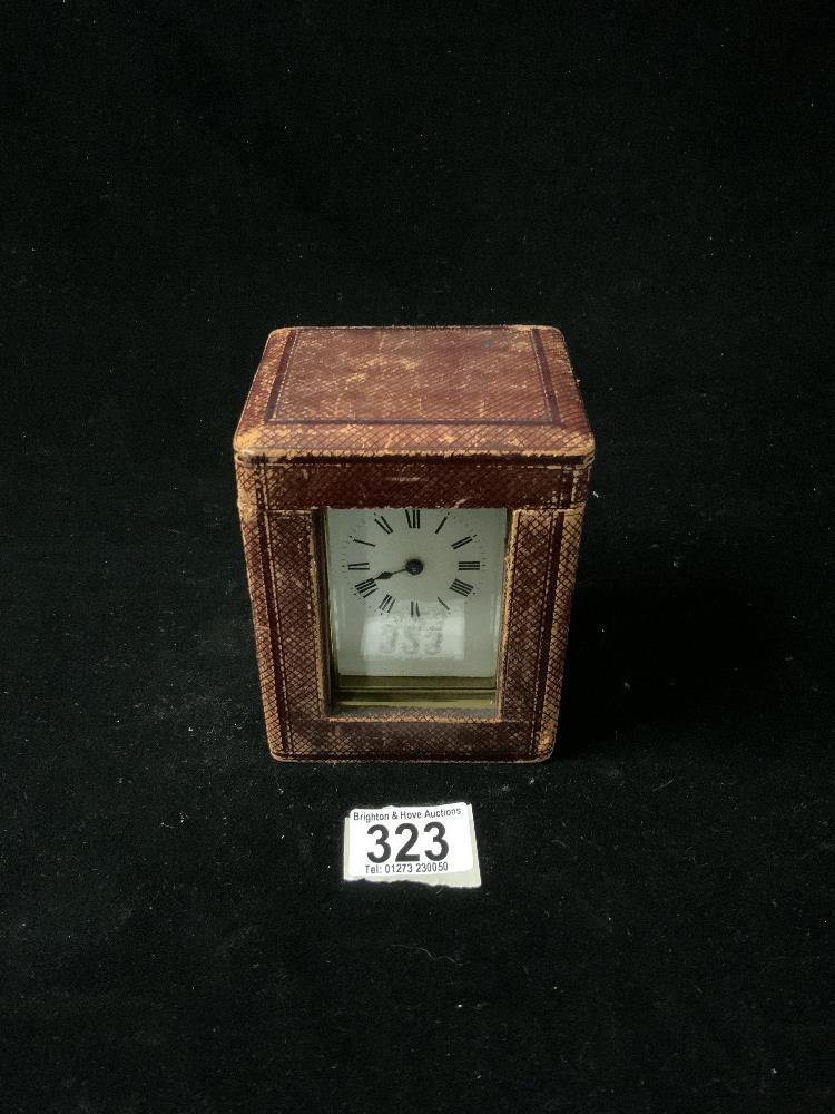 BRASS CARRIAGE CLOCK WITH WHITE ENAMEL DIAL; 11CM WITH A LEATHER OUTER CASE AND KEY - Image 2 of 5