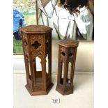 TWO CARVED SOFTWOOD HEXAGONAL MOORISH STANDS; 33CMS.