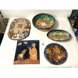 TWO MAGAL EIN HOD [ ISRAEL ] FLORAL DECORATED DISHES, LARGEST 23 CMS, AND 3 SIMILAR RELIEF PLAQUES.