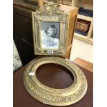 A MIRRORED GILT CUSHION PHOTO FRAME WITH A SIGNED PHOTO OF JOAN COLLINS [ NO PROVENANCE ], AND