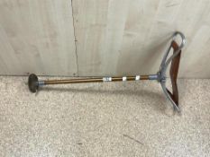 A VINTAGE ALUMINUM AND LEATHER SHOOTING STICK.