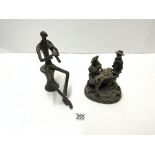 IRON SCULPTURE FIGURE OF MAN PLAYING CLARINET, 23 CMS AND A BRONZED FIGURE ' HARVEST TIME '.
