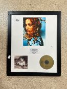 A LIMITED EDITION FRAMED MADONNA CD AND PHOTOGRAPH DISPLAY IN RECOGNITION OF OUTSTANDING SALES WORLD