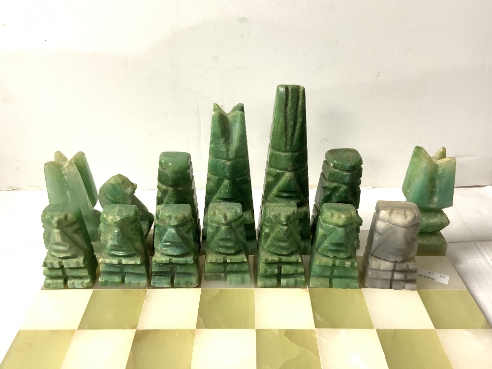 ONYX AND HARDSTONE AZTEC DESIGN CHESS SET AND BOARD, SOME DAMAGE TO PIECES. - Image 2 of 4