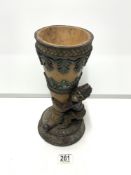 CORNUCOPIA SHAPED RESIN VASE DECORATED WITH A MONKEY 31CM