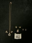 A 10K MARKED GOLD DIAMOND AND SAPPHIRE NECKLACE AND EARRING SET, AMYTHEST COLOR STONE PENDANT, AND 2