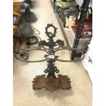 VICTORIAN IRON STICK STAND WITH SEA SERPENT DECORATION.