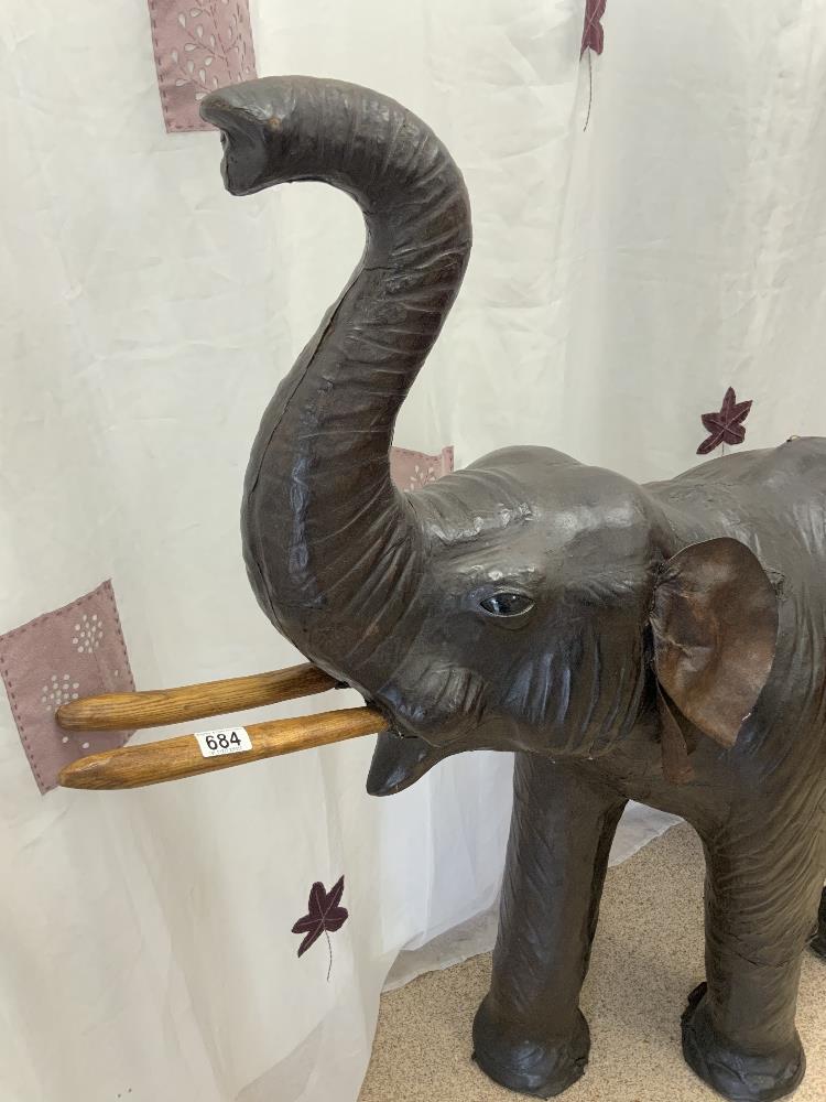 A LARGE LEATHER DISPLAY MODEL ELEPHANT IN THE MANNER OF LIBERTY, 128X130 CMS. - Image 2 of 5