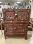 A CHINESE RED PAINTED 2 PART FOUR DOOR CABINET, DECORATED WITH FIGURES ON HORSE BACK, 93X42X124
