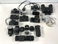 A QUANTITY OF CAMERAS, LENSES AND MORE WITH A PAIR OF PRINZ BINOCULARS (10X50). INCLUDES ZENIT,