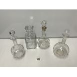 FOUR GLASS DECANTERS ONE BACCARAT AND ONE WITH A HALLMARKED SILVER COLLAR