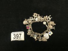 HALLMARKED SILVER CHARM BRACELET WITH CHARMS