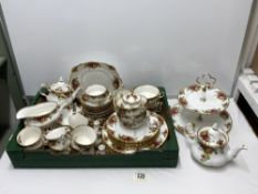 ROYAL ALBERT OLD COUNTRY ROSES 56 PIECE TEA AND DINNER SET, ALSO INCLUDES A CAKE STAND.