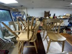 A SET OF SIX SPINDLE BACK KITCHEN CHAIRS.