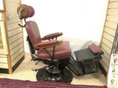 A LATE VICTORIAN AJUSTABLE IRON DENTISTS CHAIR.