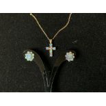 375 HALLMARKED OPAL SET CROSS ON CHAIN AND PAIR EARRINGS.