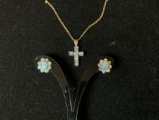375 HALLMARKED OPAL SET CROSS ON CHAIN AND PAIR EARRINGS.