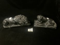 TWO BLACK EBONISED RESIN MODELS OF RECUMBENT LION AND LIONESS; 26X10 CMS.