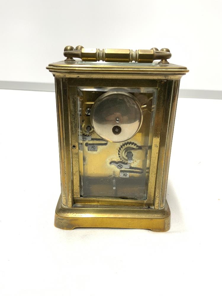 BRASS CARRIAGE CLOCK WITH STRIKING ALARM MOVEMENT AND WHITE ENAMEL DIAL 11CM ( REAR DOOR LOOSE ) - Image 4 of 5