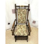 LATE VICTORIAN TURNED SUPPORT IRON SPRUNG ROCKING CHAIR, WITH UPHOLSTERED SEAT AND BACK.
