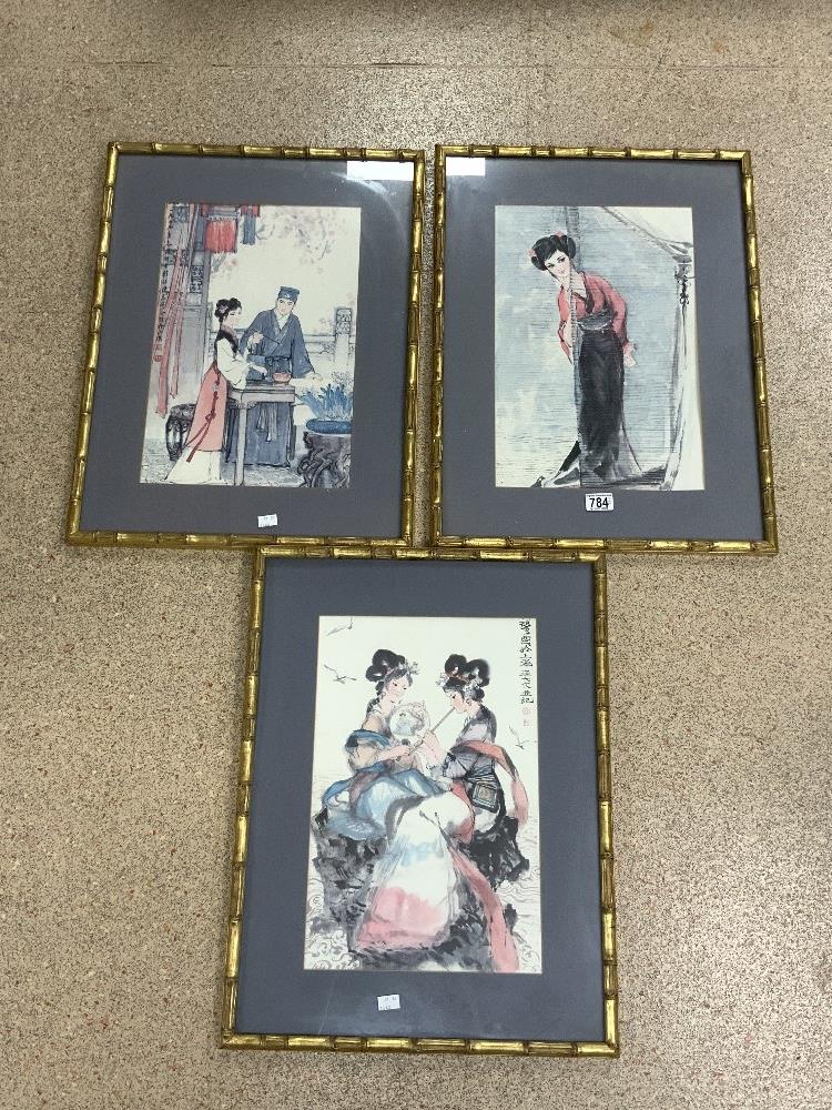THREE CHINESE PRINTS FRAMED AND GLAZED WITH A BAMBOO STYLE FRAME 49 X 64CM