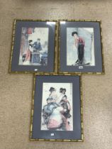 THREE CHINESE PRINTS FRAMED AND GLAZED WITH A BAMBOO STYLE FRAME 49 X 64CM