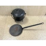 CAST IRON COOKING POT ON 3 LEGS WITH LID, AND IRON FRYING PAN.