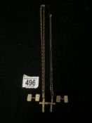 A 375 HALLMARKED GOLD CROSS ON A 9 K MARKED CHAIN, AND ANOTHER, AND A PR OF 375 HALLMARKED