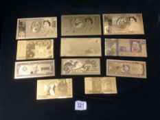 SEVEN GOLD PLATED BANK NOTES.