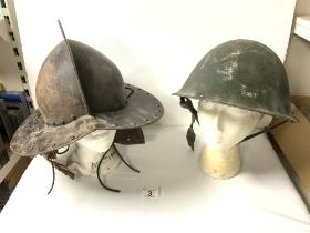 A MEDIEVAL STYLE METAL HELMET AND A BRITISH MARK V TURTLE HELMET 1972.