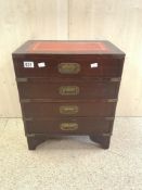 MILITARY STYLE CHEST OF FOUR DRAWERS BRASS BOUND RED TOOLED LEATHER TOP 54 X 30 X 46CM