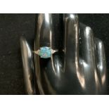 A 375 HALLMARKED GOLD OPAL A/F SET RING, SIZE O, 2.2 GRAMS.