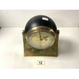 A VINTAGE BRASS AND METAL, WESTWOOD 8 DAY SEARCH LIGHT MANTLE CLOCK.