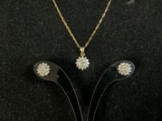 A 375 HALLMARKED GOLD DIAMOND SET PENDANT ON CHAIN AND PAIR OF MATCHING EARRINGS.