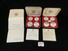 TWO OLYMPIC SERIES SILVER COIN SETS IN CASES, EACH CASE HAS TWO 10 AND TWO 5 DOLLAR COINS.