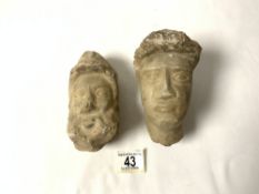 TWO ANTIQUE CARVED MARBLE HEADS; 16 CMS.