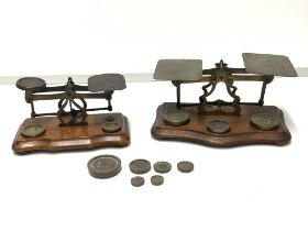 TWO SETS OF VICTORIAN BRASS POSTAL SCALES WITH WEIGHTS LARGEST 20CM