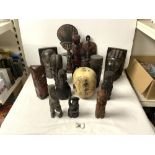 A QUANTITY OF CARVED WOODEN; AFRICAN AND OTHER; BUSTS AND MASKS,