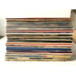 QUANTITY OF ALBUMS INCLUDES - BEATLES , DAVID BOWIE AND MORE.INCLUDES SOME FIRST PRESSING