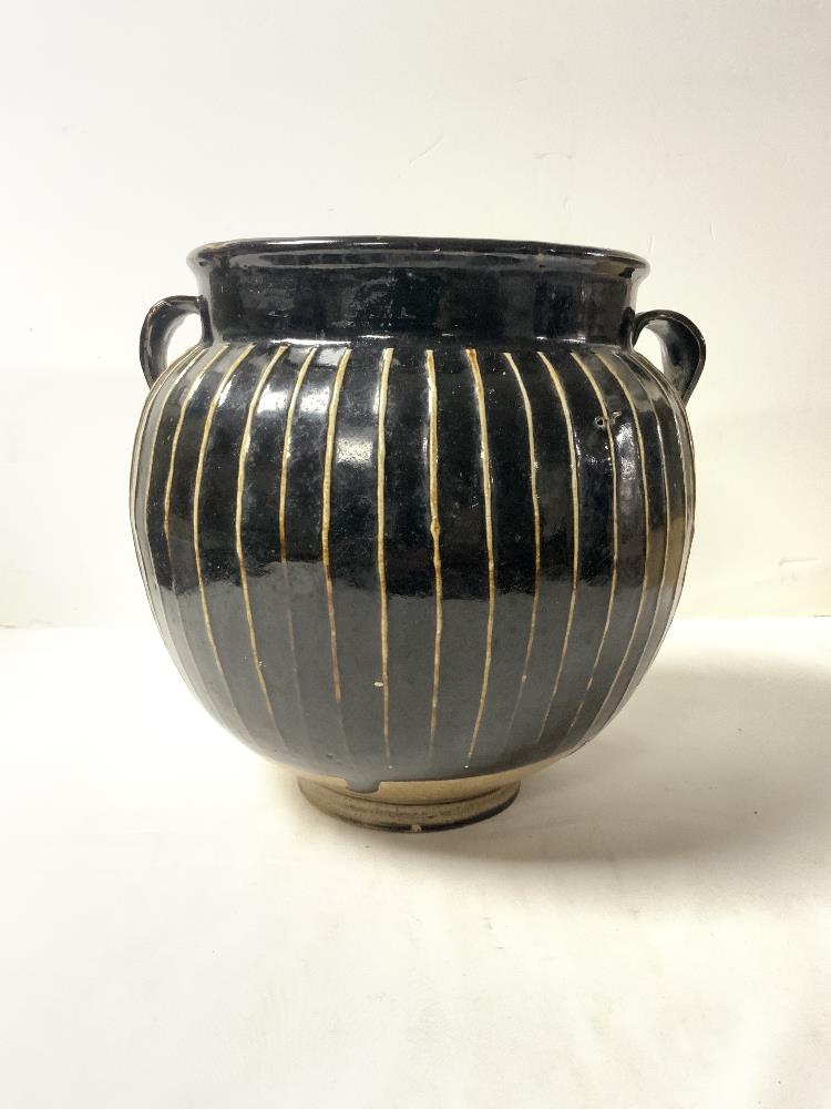 BROWN SLIPWARE GLAZED POTTERY 2 HANDLED JARDINERE, 22 CMS.