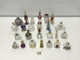 COLLECTION OF DECORATIVE GLASS PERFUME BOTTLES