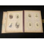 A VICTORIAN EMBOSSED LEATHER FAMILY PHOTO ALBUM, WITH PHOTOGRAPHS.