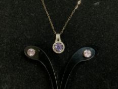 A 375 HALLMARKED GOLD DIAMOND AND AMYTHEST SET PENDANT ON CHAIN AND PAIR OF EARRINGS.