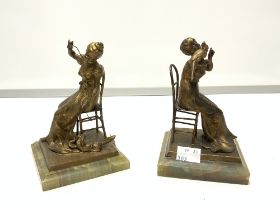 PAIR OF 19TH-CENTURY FRENCH GILT BRONZE FIGURES OF SEATED LADIES ON GREEN ONYX BASES (ONE MISSING