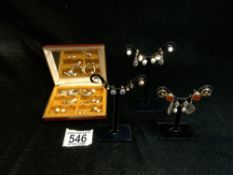 SEVEN PAIRS OF 9CT EARRINGS IN BOXES AND A QUANTITY OF LOOSE EARRINGS.