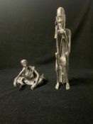 TWO AFRICAN BRONZE FIGURES OF TRIBESMEN; LARGEST 26.5 CMS.