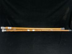 TWO VICTORIAN HALLMARKED SILVER TOPPED WALKING CANES, LONGEST 90 CMS.