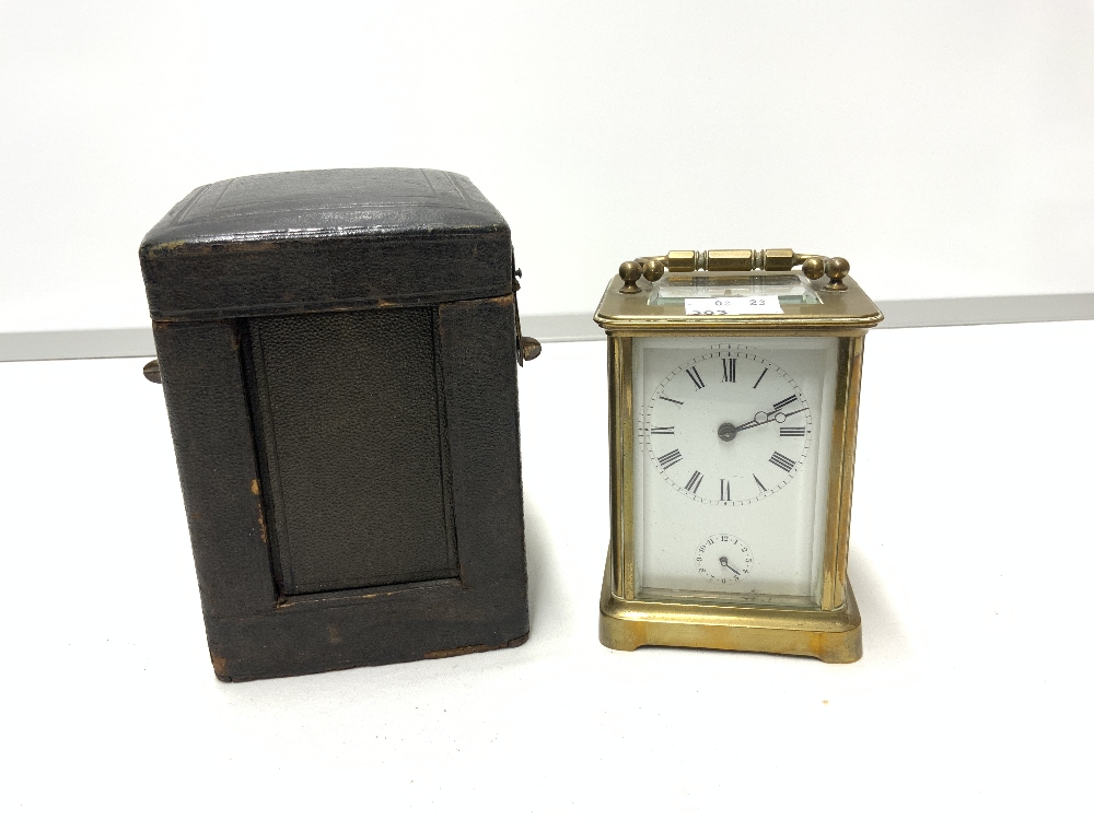 BRASS CARRIAGE CLOCK WITH STRIKING ALARM MOVEMENT AND WHITE ENAMEL DIAL 11CM ( REAR DOOR LOOSE )