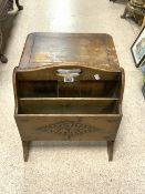 A 1940s OAK MAGAZINE RACK WITH FOLDING FLAP.