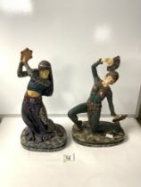 PAIR OF ART DECO STYLE COMPOSITION FIGURES OF EXOTIC DANCERS ON OVAL SIMULATED MARBLE PLINTHS;